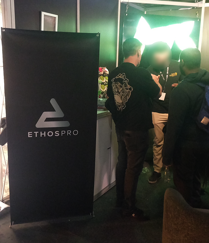 An X-banner at an exhibition printed for Ethos pro by Brand Monster.