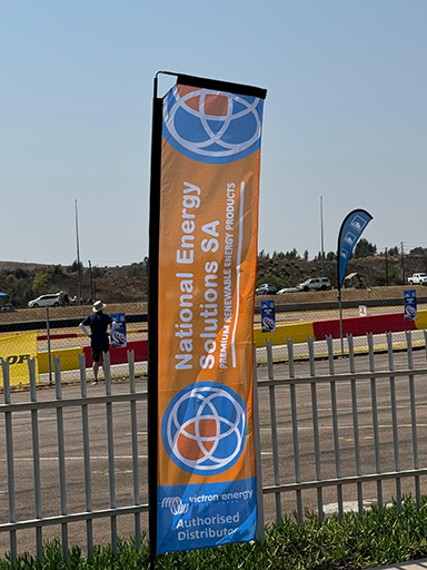 A telescopic banner branded for Victron Energy at an outdoor promotion